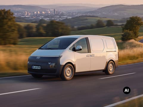 Hyundai STARIA Cargo по път в селска местност.