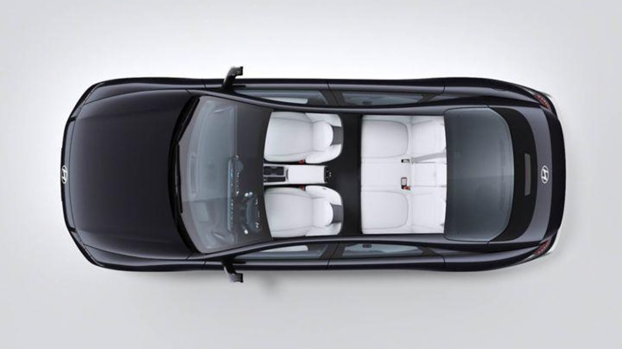 Video of IONIQ 6 showing spilt rear seats fold down for 2054 litres of cargo space.