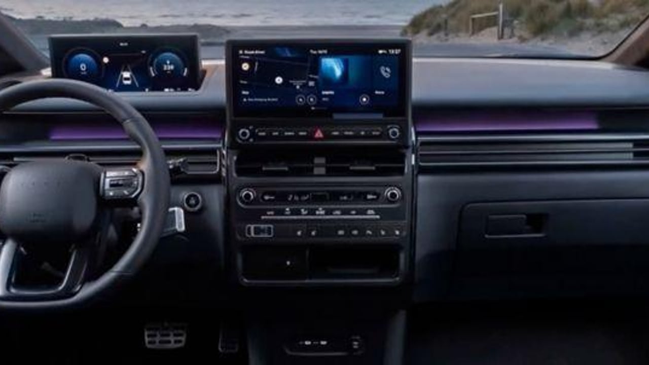 Hyundai STARIA Electric dashboard showcasing dual screens and a steering wheel.
