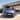 A woman entering the driver's side of the new i10 Hyundai.