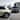 Два нови компактни електрически автомобила Hyundai INSTER на паркинг.