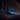 Hyundai IONIQ 6 N electric sports sedan cruising through evening city streets with LED headlights illuminated.