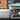 Close up of the bi-colour front grille and round LED daytime running lights of INSTER Lounge.