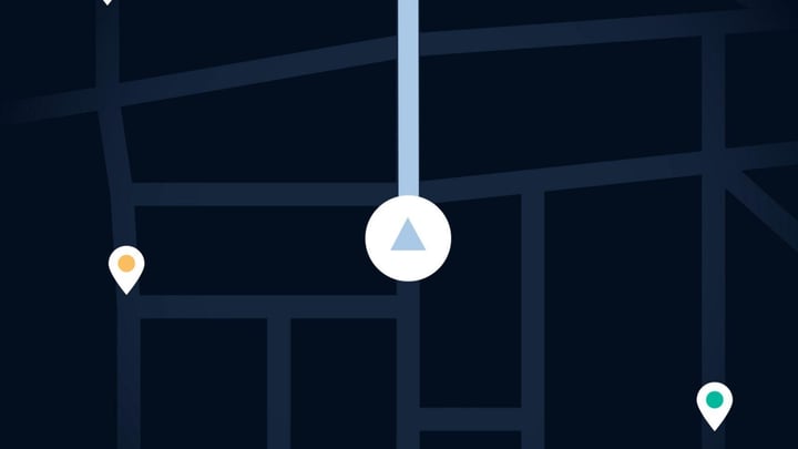 Dark map interface with a central navigation icon and three location markers in different colours.
